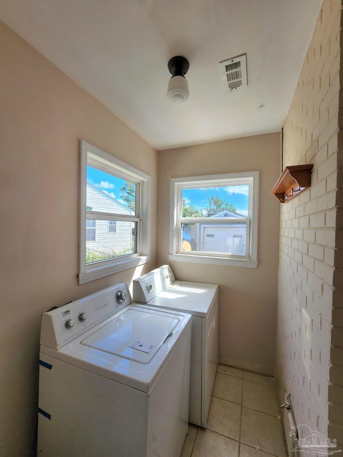 206 Berry Road Pensacola, FL 32507 - Photo 4 of 17 a bathroom with a sink and a mirror