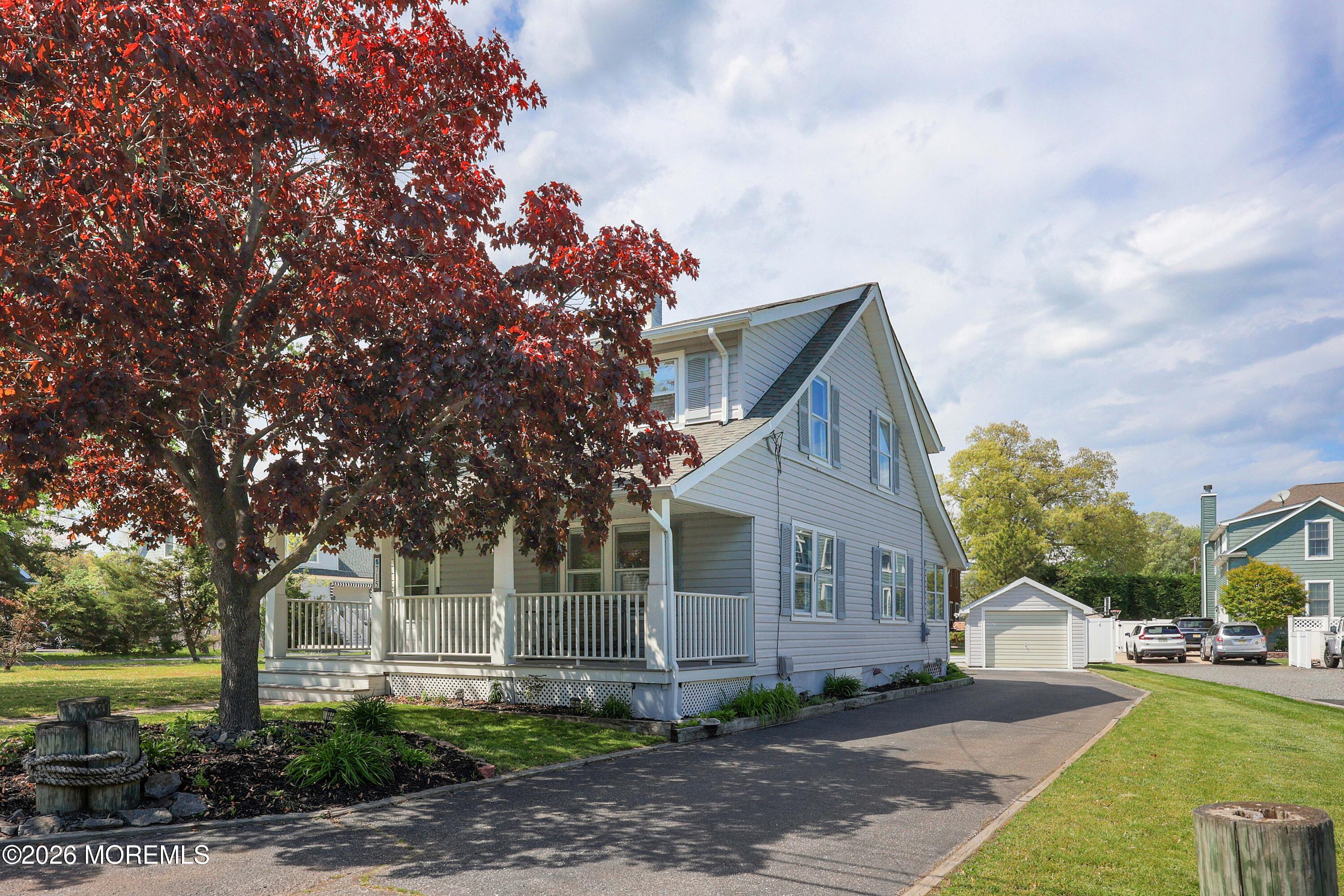 715 Howe Street Point Pleasant, NJ 08742 - Photo 4 of 45 a front view of a house with garden
