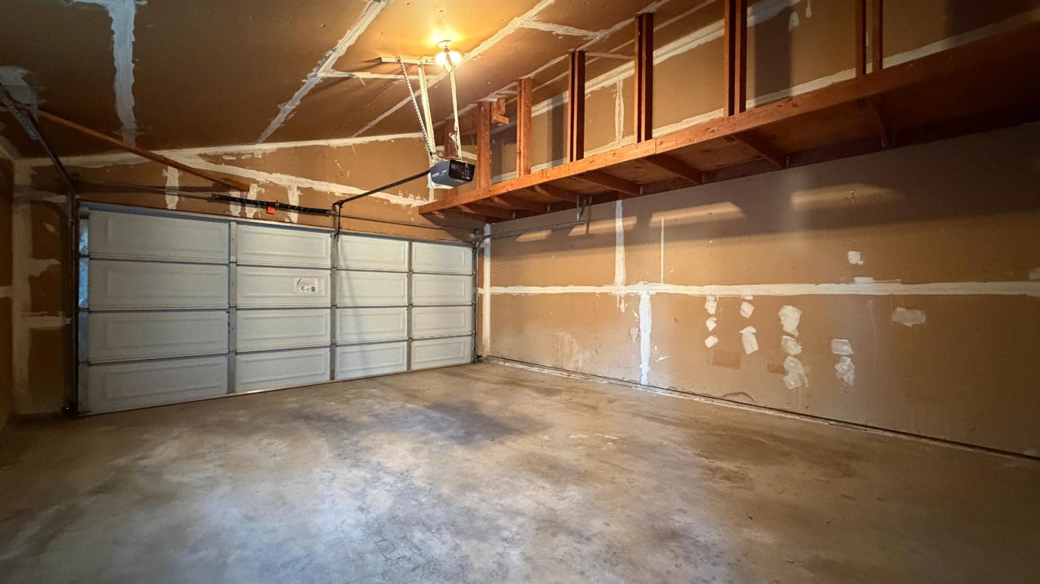 1555 West Boston Avenue, Unit 101 Fresno, CA 93711 - Photo 19 of 20 a view of a garage