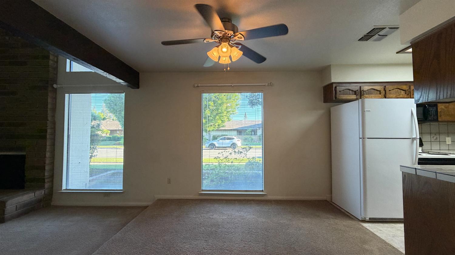 1555 West Boston Avenue, Unit 101 Fresno, CA 93711 - Photo 7 of 20 a view of an empty room with a window