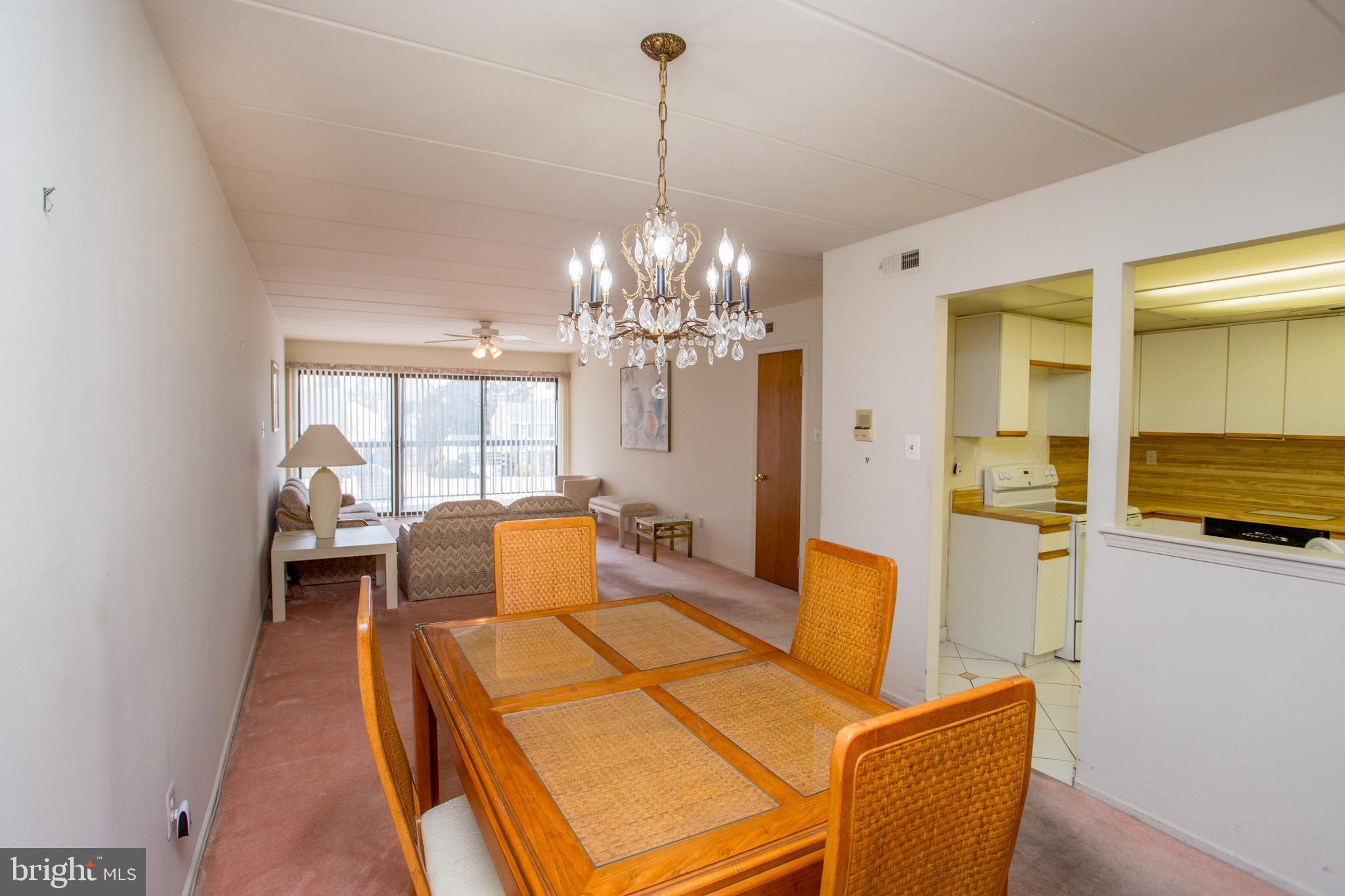 2131 Welsh Road, Unit 207 Philadelphia, PA 19115 - Photo 16 of 46 a bedroom with a bed and ceiling fan