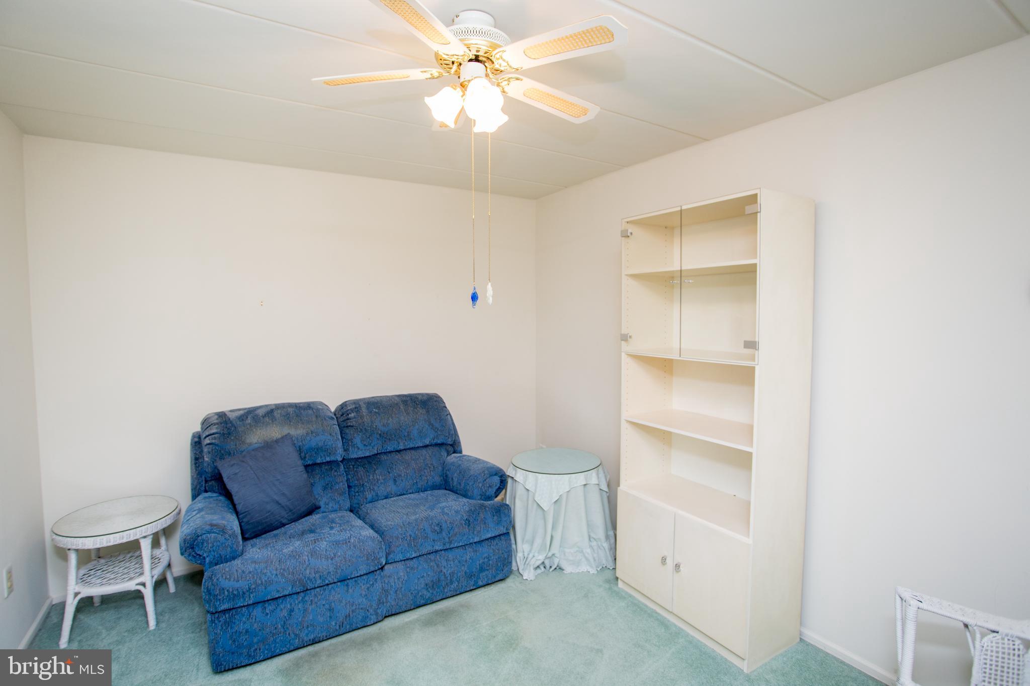 2131 Welsh Road, Unit 207 Philadelphia, PA 19115 - Photo 20 of 46 a living room with furniture and a ceiling fan