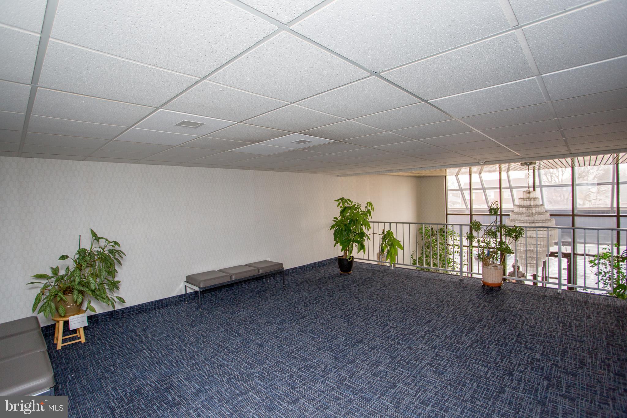 2131 Welsh Road, Unit 207 Philadelphia, PA 19115 - Photo 32 of 46 a view of an empty room with a window