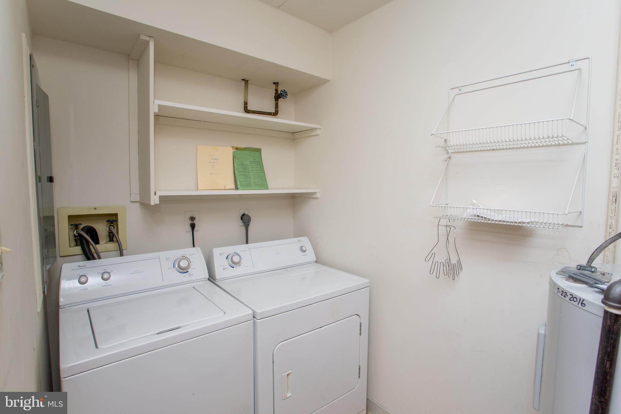 2131 Welsh Road, Unit 207 Philadelphia, PA 19115 - Photo 36 of 46 a utility room with dryer and washer
