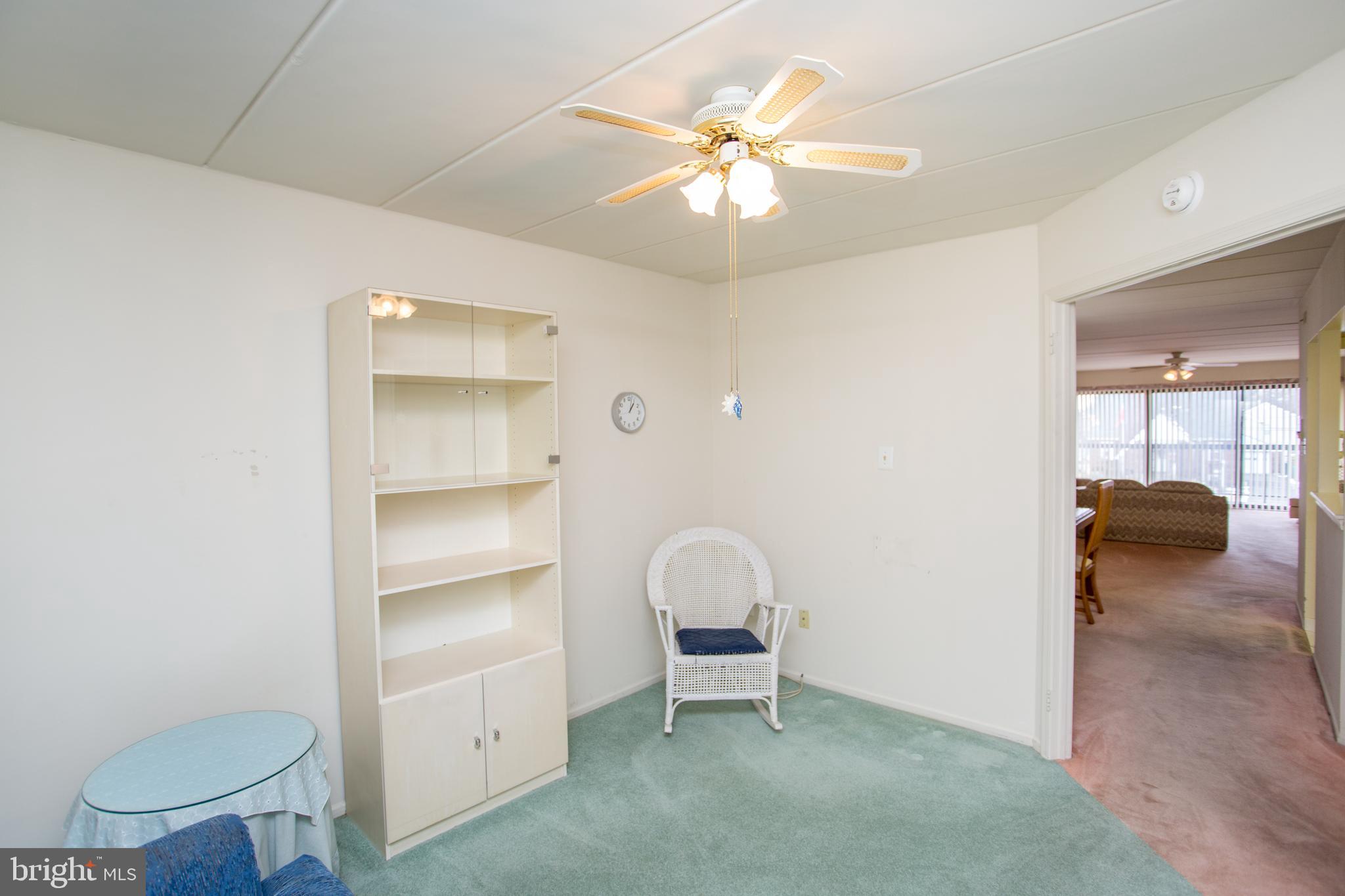 2131 Welsh Road, Unit 207 Philadelphia, PA 19115 - Photo 38 of 46 a view of a room with a furniture and a fan