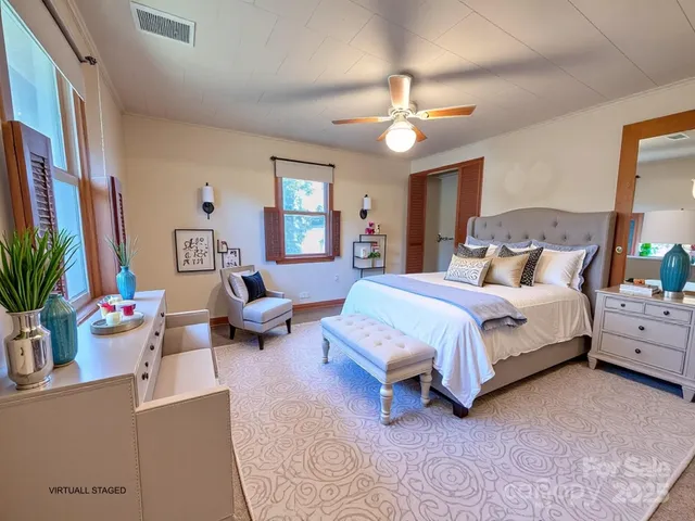 a view of a chairs and table in a room