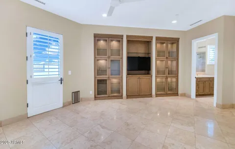 a view of a kitchen with a sink and dishwasher cabinets