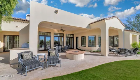 a view of a patio with a backyard