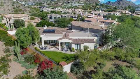 a view of a patio with a yard