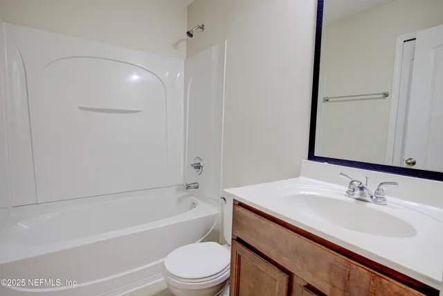 a bathroom with a sink toilet and a bathtub
