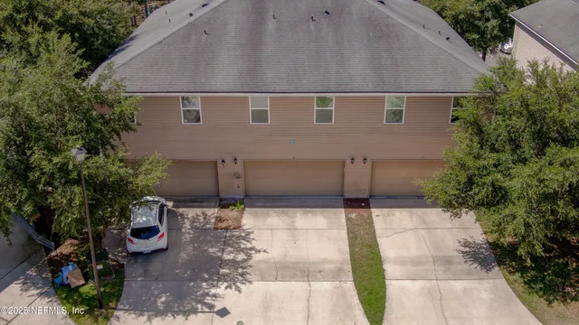 a view of houses with outdoor space and sitting space