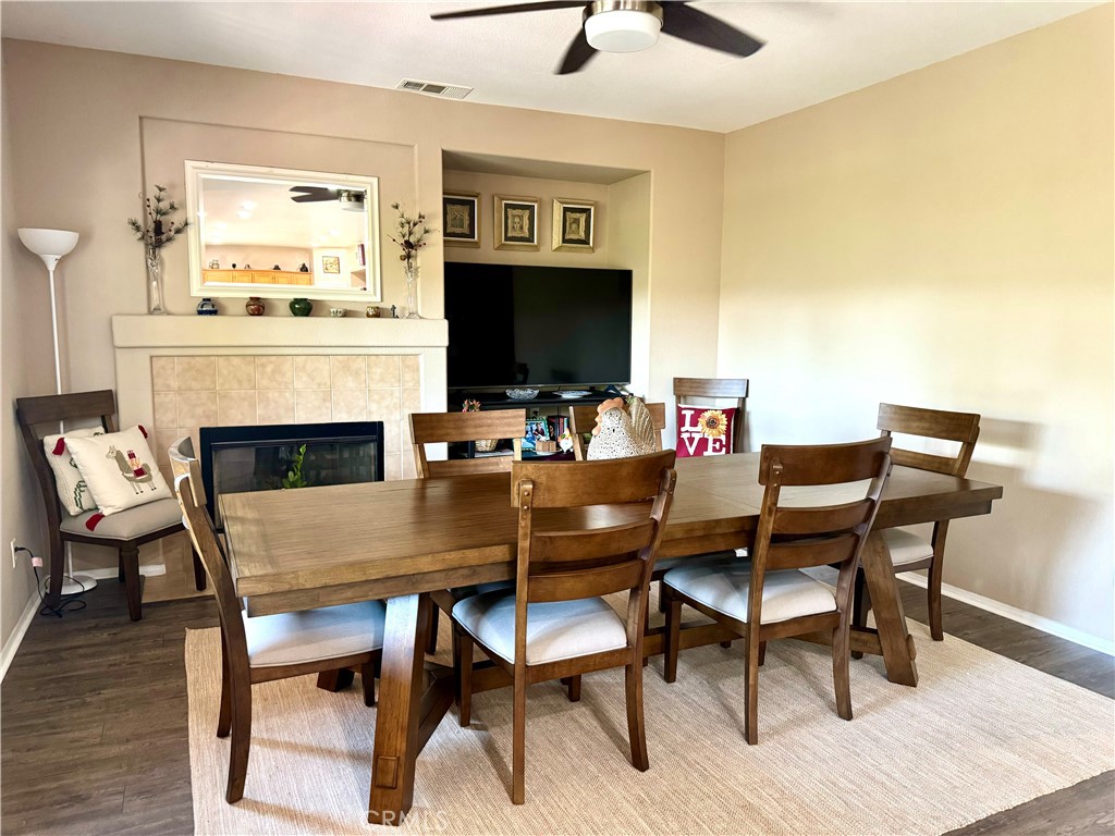 37041 Populus Avenue Palmdale, CA 93552 - Photo 7 of 30 a view of a dining room with furniture