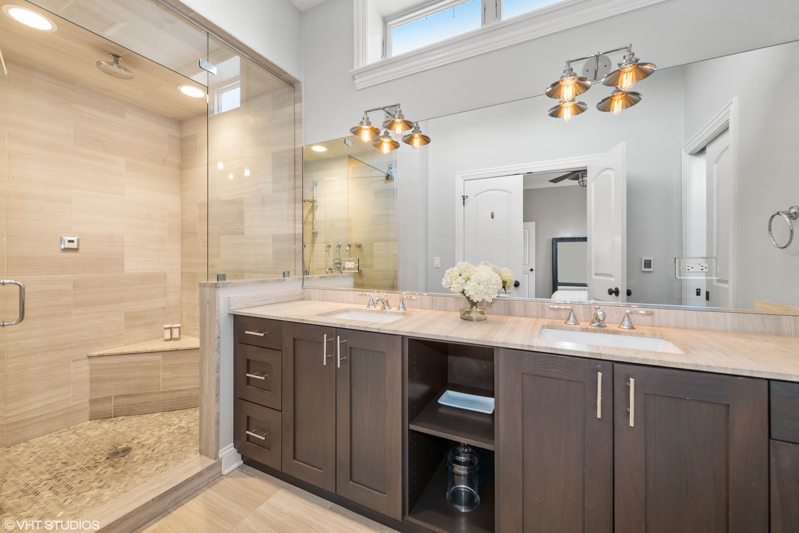 1944 West Fletcher Street, Unit 3E Chicago, IL 60657 - Photo 15 of 28 a bathroom with a double vanity sink and a mirror