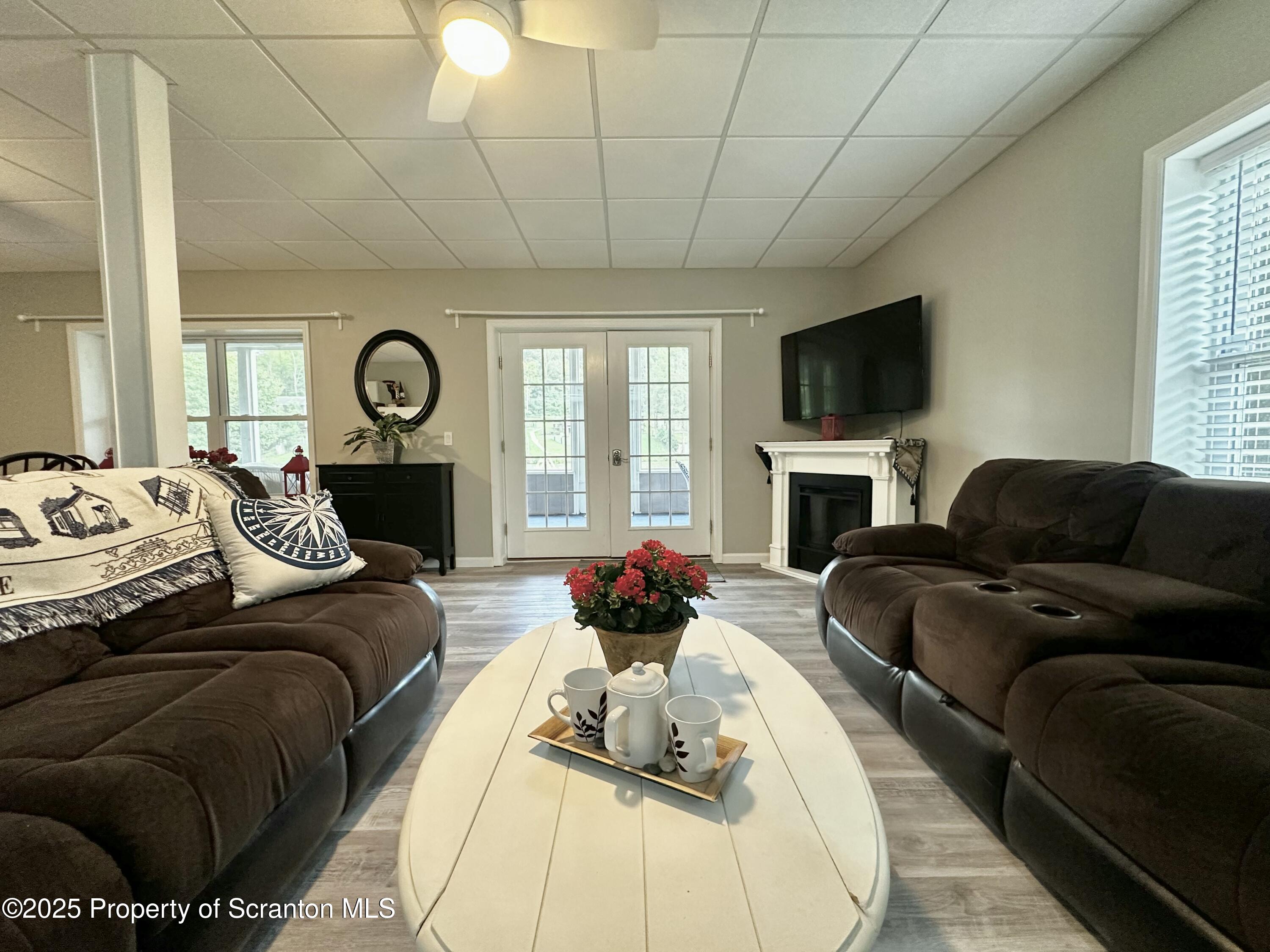 214 Lake Road Nicholson, PA 18446 - Photo 17 of 38 LL Family Room