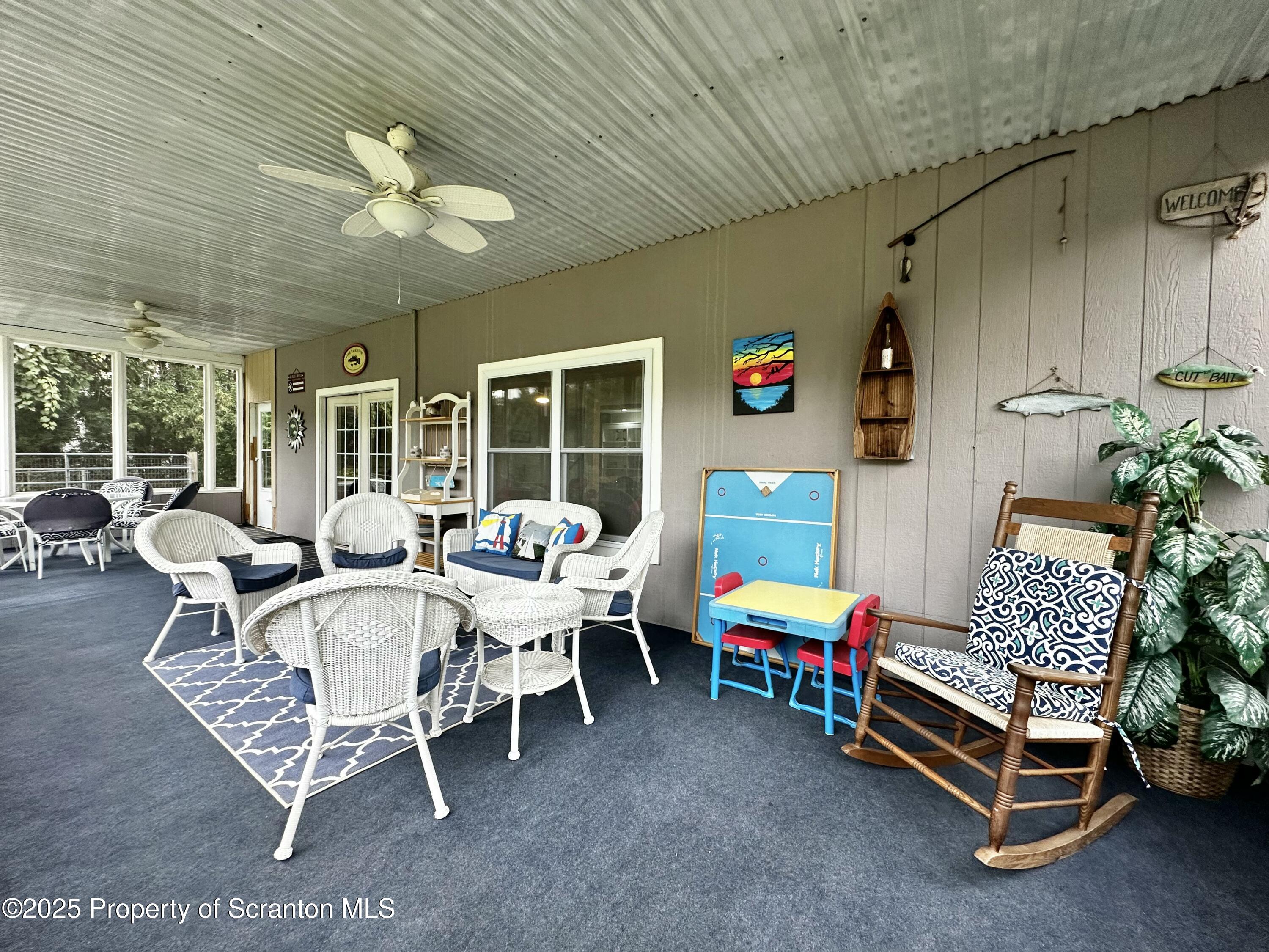 214 Lake Road Nicholson, PA 18446 - Photo 23 of 38 LL Screened Porch