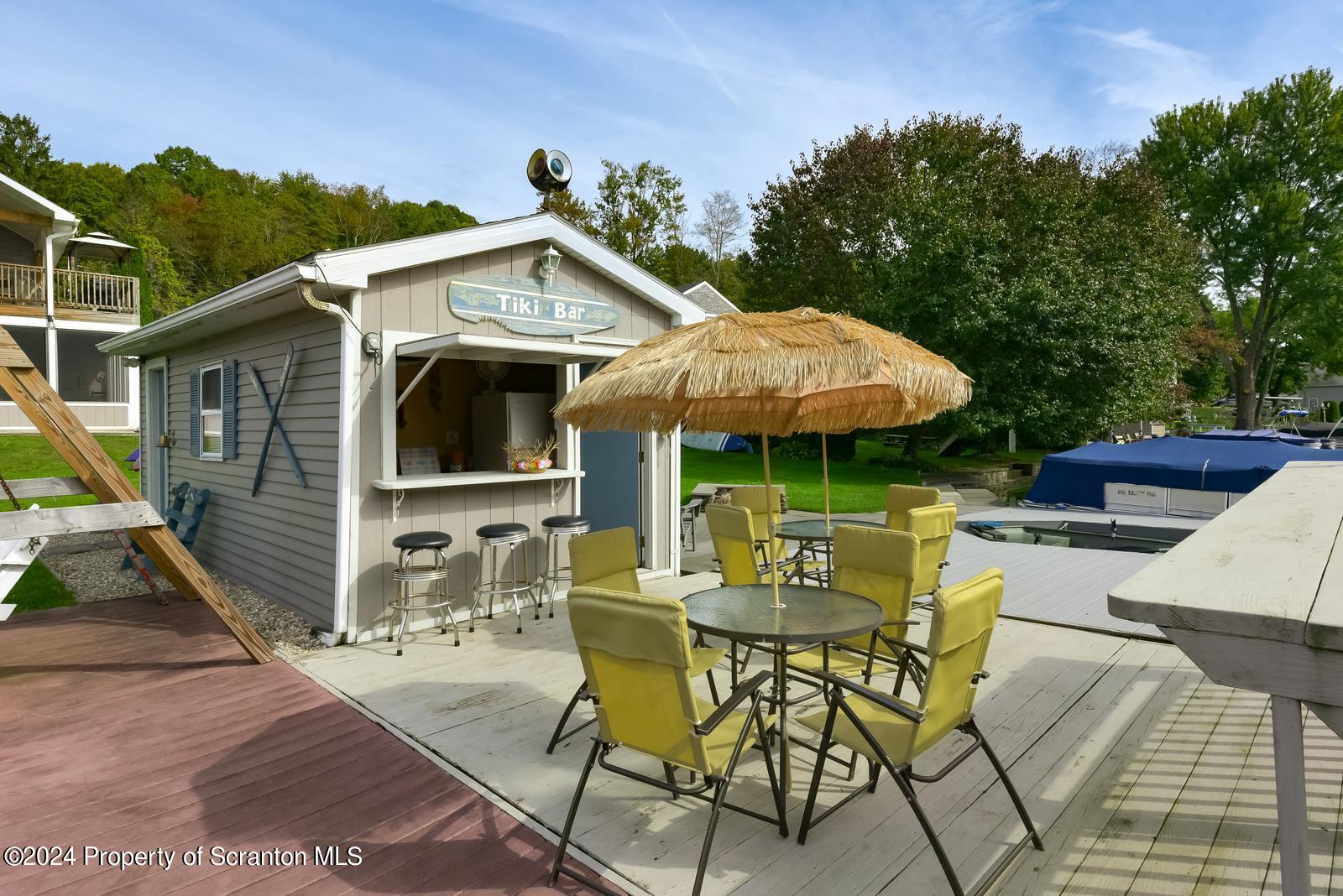 214 Lake Road Nicholson, PA 18446 - Photo 30 of 38 Tiki Bar & Entertaining Dock