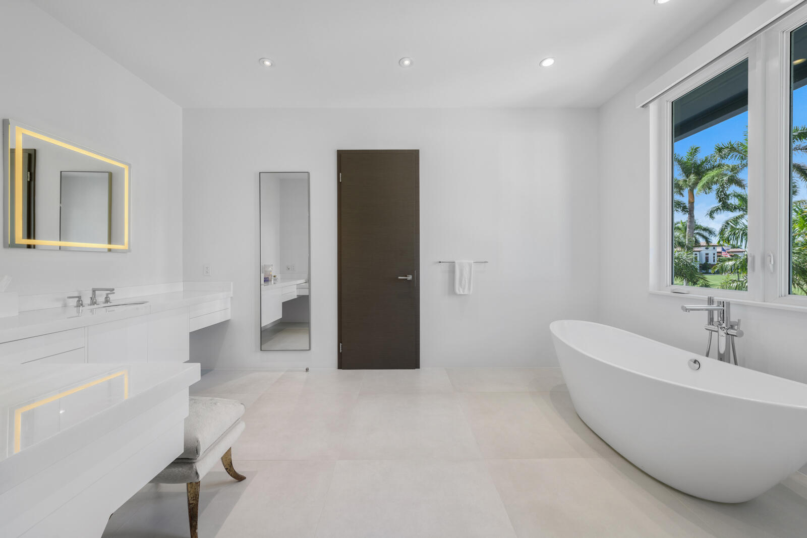 1900 Sabal Palm Drive Boca Raton, FL 33432 - Photo 19 of 75 a bathroom with a bathtub and a sink