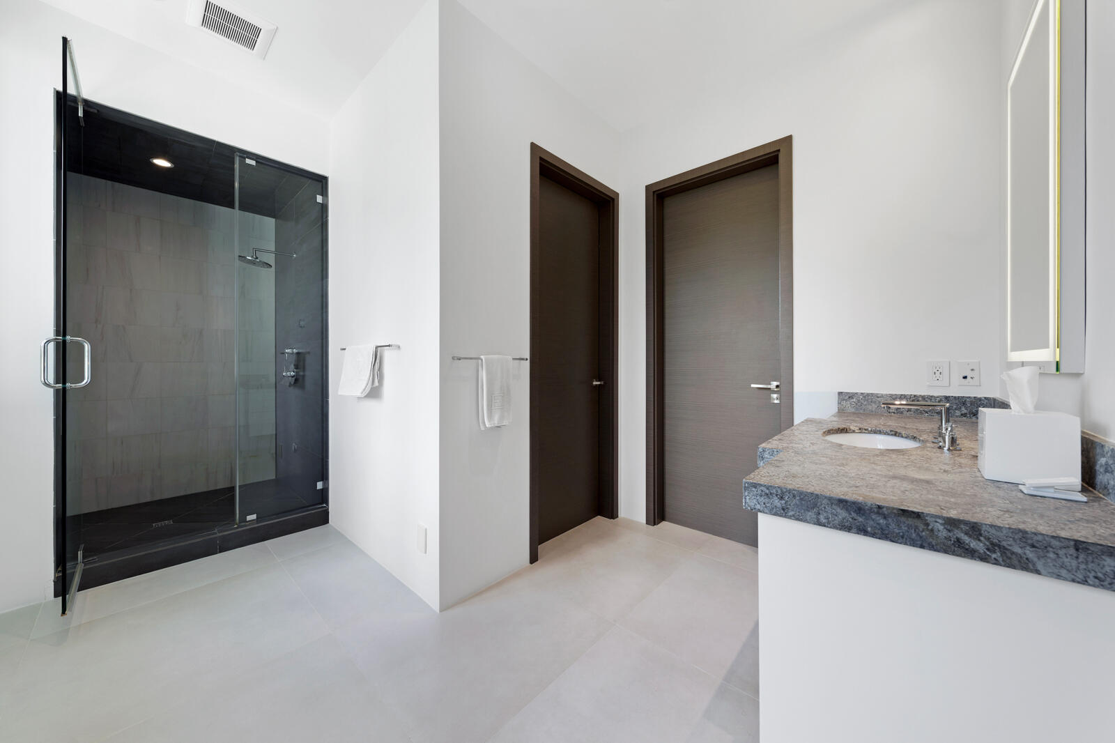 1900 Sabal Palm Drive Boca Raton, FL 33432 - Photo 33 of 75 a bathroom with a granite countertop sink and a mirror