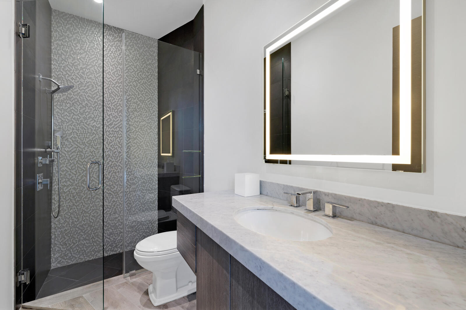 1900 Sabal Palm Drive Boca Raton, FL 33432 - Photo 38 of 75 a bathroom with a granite countertop sink toilet and shower