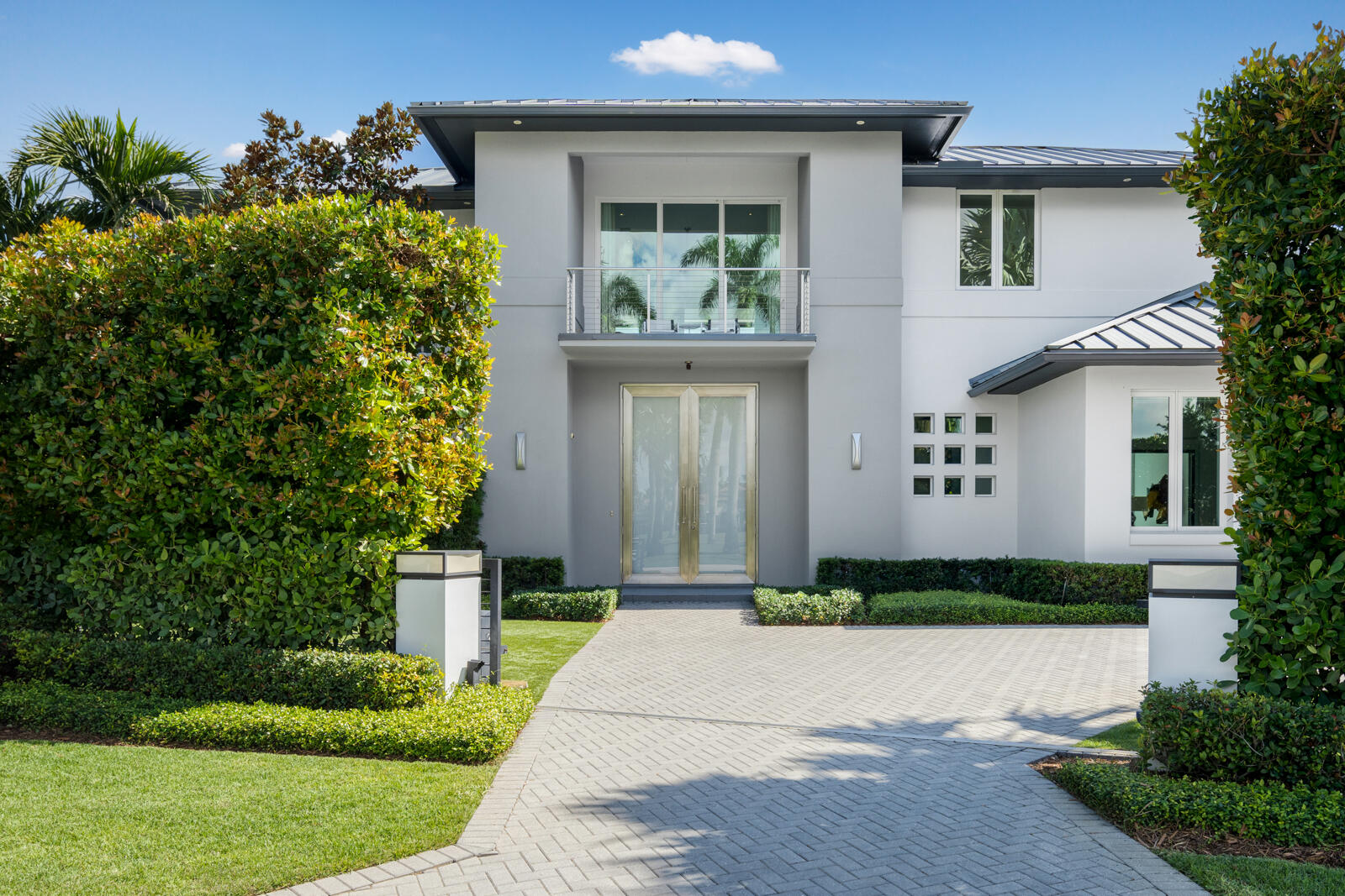 1900 Sabal Palm Drive Boca Raton, FL 33432 - Photo 59 of 75 a front view of a house with garden