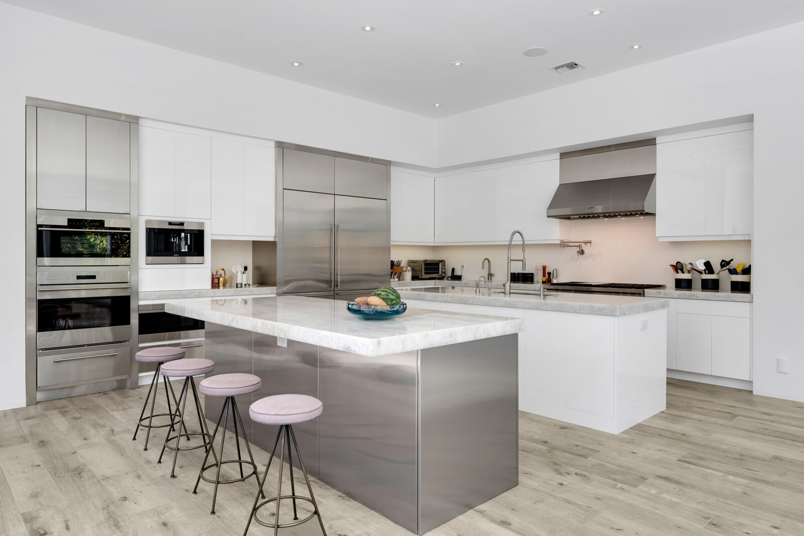 1900 Sabal Palm Drive Boca Raton, FL 33432 - Photo 9 of 75 a kitchen with stainless steel appliances granite countertop a stove top oven a sink a counter space and cabinets