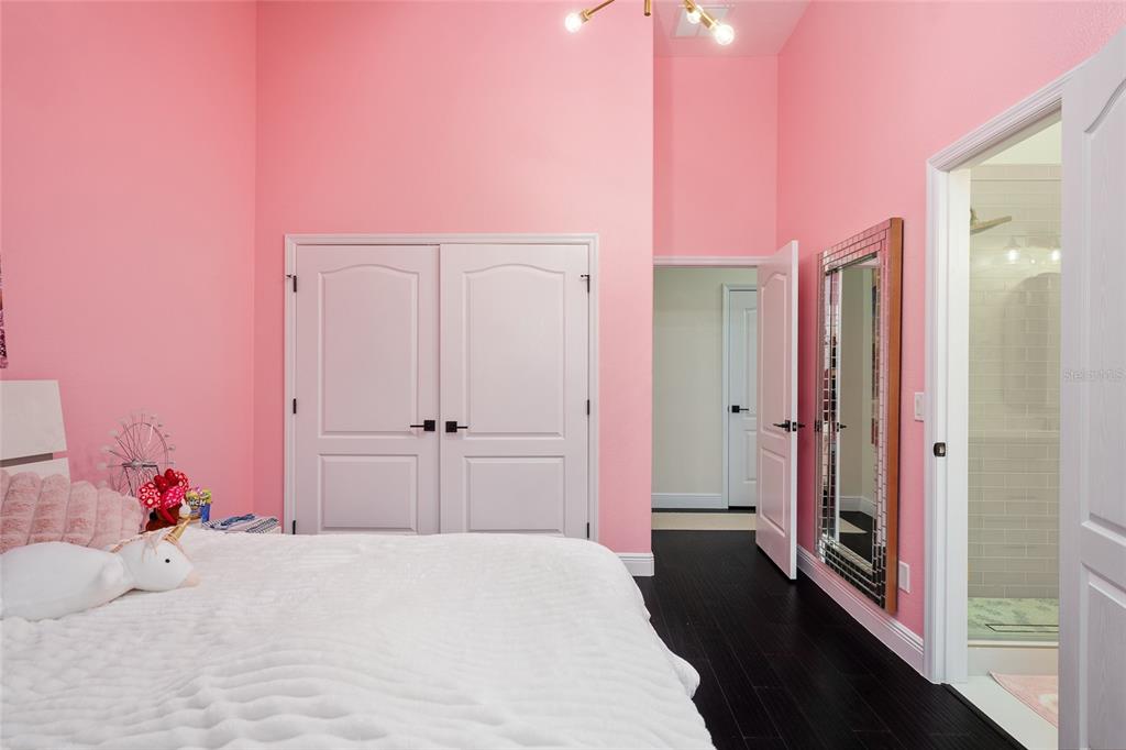 152 Riggings Way Clermont, FL 34711 - Photo 56 of 68 a bedroom with a bed and a closet