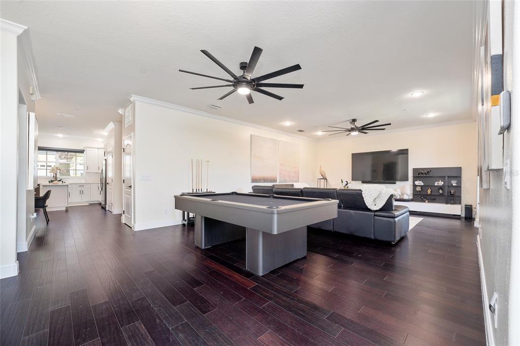 152 Riggings Way Clermont, FL 34711 - Photo 6 of 68 a living room with couches and a view of kitchen
