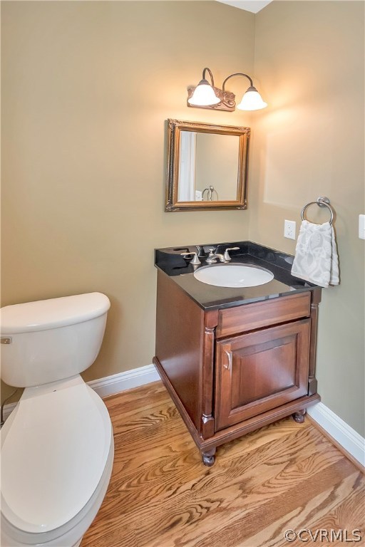 10705 Chatham Ridge Way Spotsylvania, VA 22551 - Photo 5 of 40 a bathroom with a toilet sink and mirror