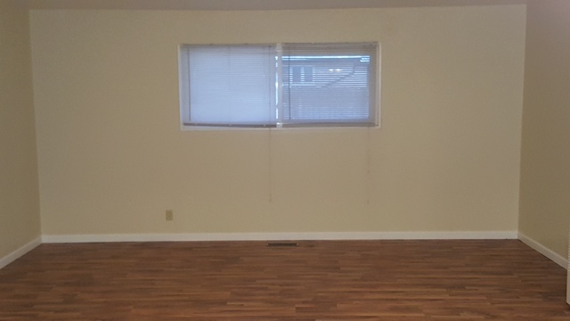 125 West Briarcliff Road Bolingbrook, IL 60440 - Photo 11 of 19 a view of a small space with wooden floor and a window