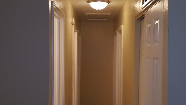 125 West Briarcliff Road Bolingbrook, IL 60440 - Photo 12 of 19 a view of a bathroom from a hallway