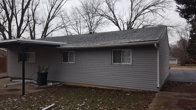 125 West Briarcliff Road Bolingbrook, IL 60440 - Photo 3 of 19 a house that has a tree in front of the house