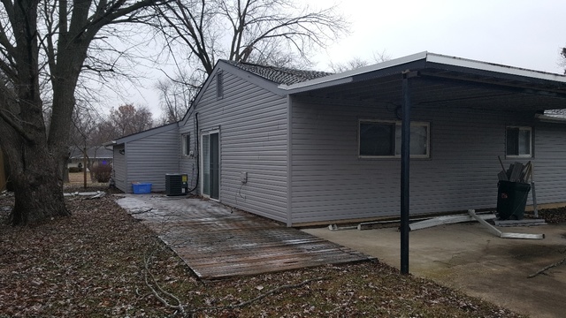 125 West Briarcliff Road Bolingbrook, IL 60440 - Photo 4 of 19 a front view of a house
