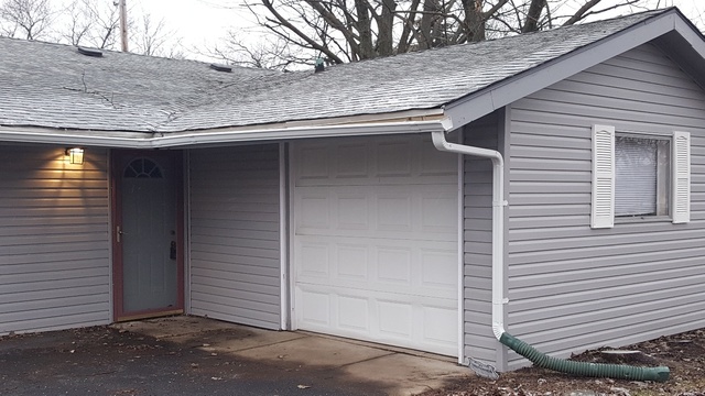 125 West Briarcliff Road Bolingbrook, IL 60440 - Photo 5 of 19 a view of a house with a door and wooden door
