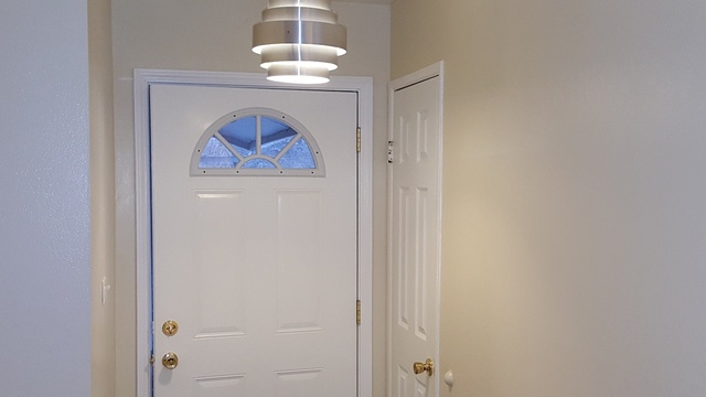 125 West Briarcliff Road Bolingbrook, IL 60440 - Photo 7 of 19 a view of room with a painting on the wall