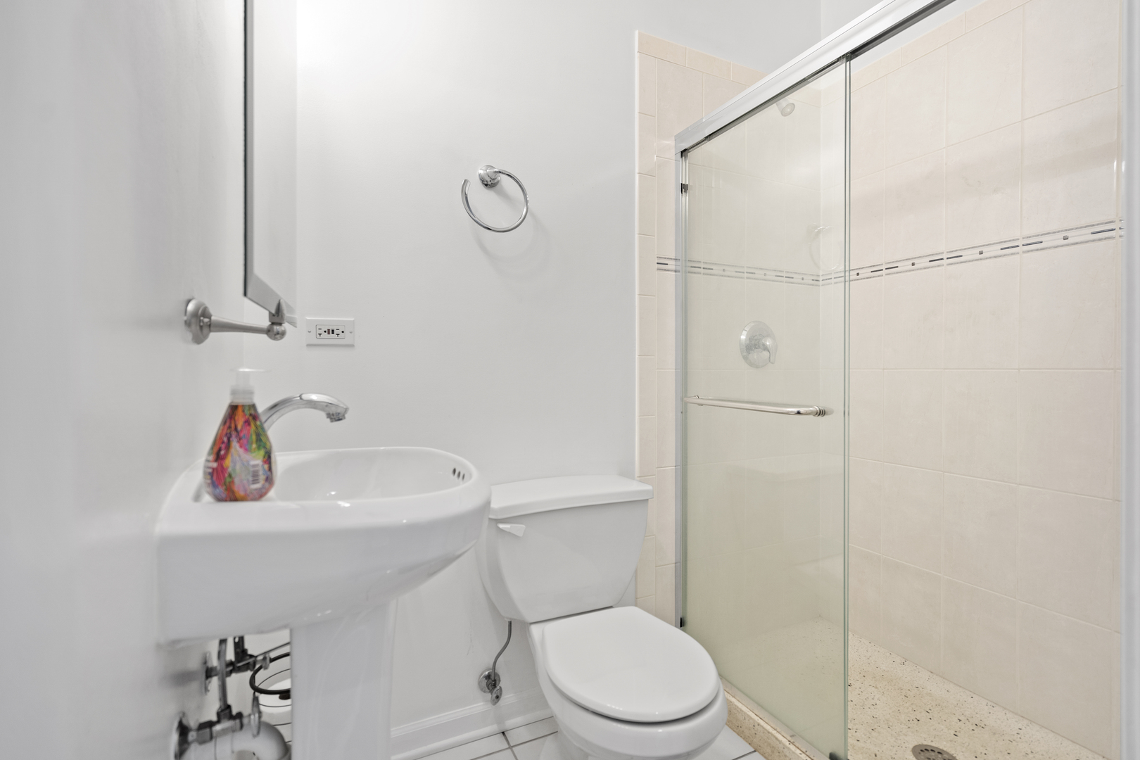 2539 West Warren Boulevard, Unit 2 Chicago, IL 60612 - Photo 11 of 14 a bathroom with a sink a toilet and shower