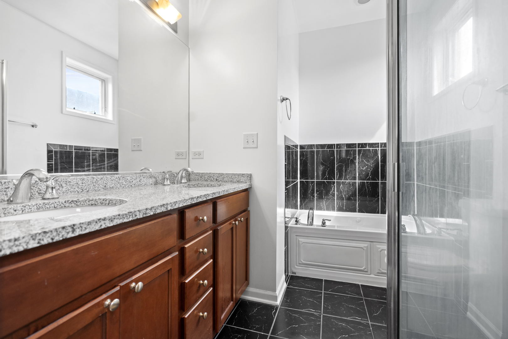 2539 West Warren Boulevard, Unit 2 Chicago, IL 60612 - Photo 12 of 14 a bathroom with a sink and a toilet