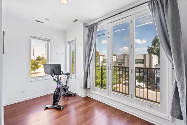 a view of a room with gym equipment