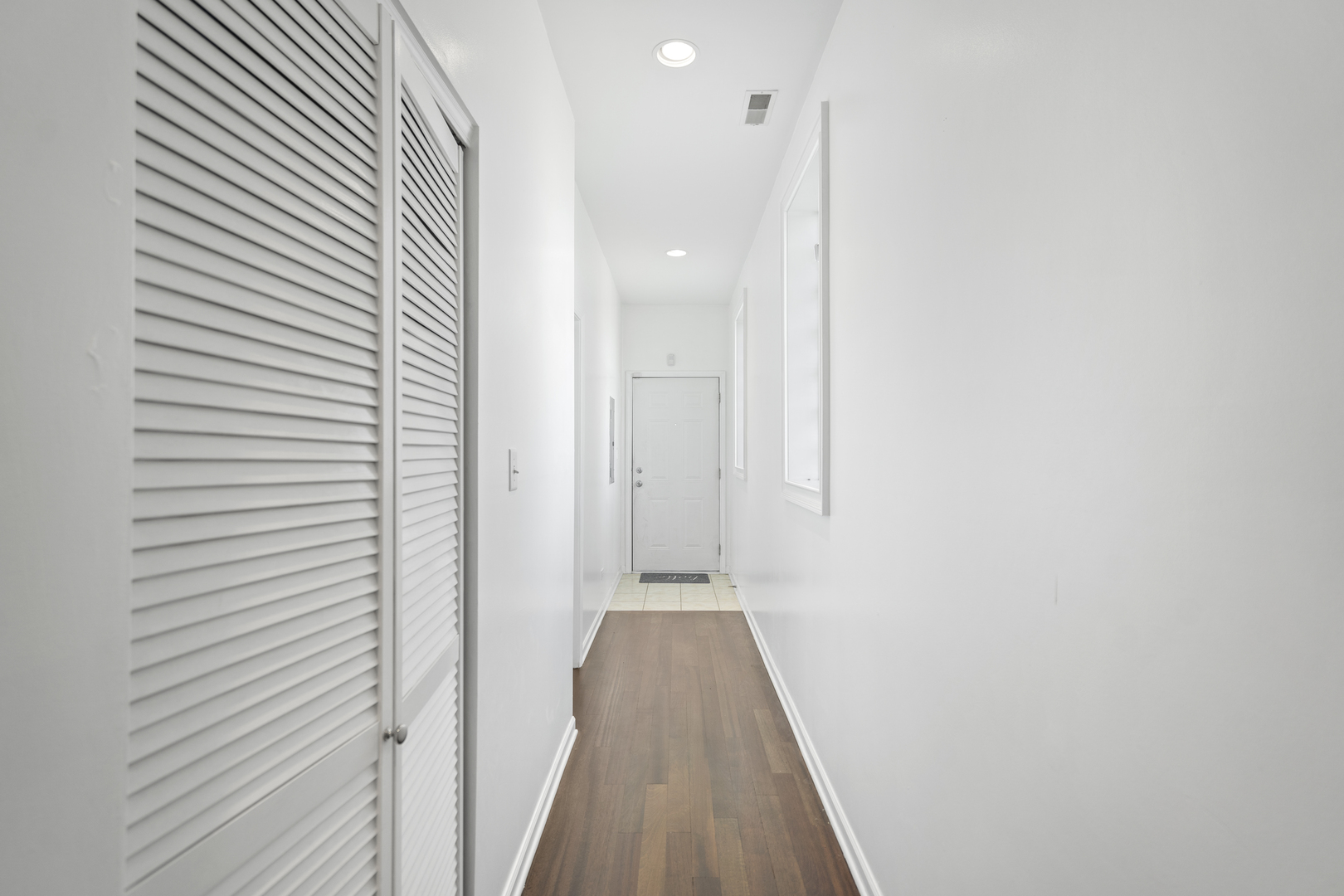 2539 West Warren Boulevard, Unit 2 Chicago, IL 60612 - Photo 8 of 14 a view of a hallway with wooden floor