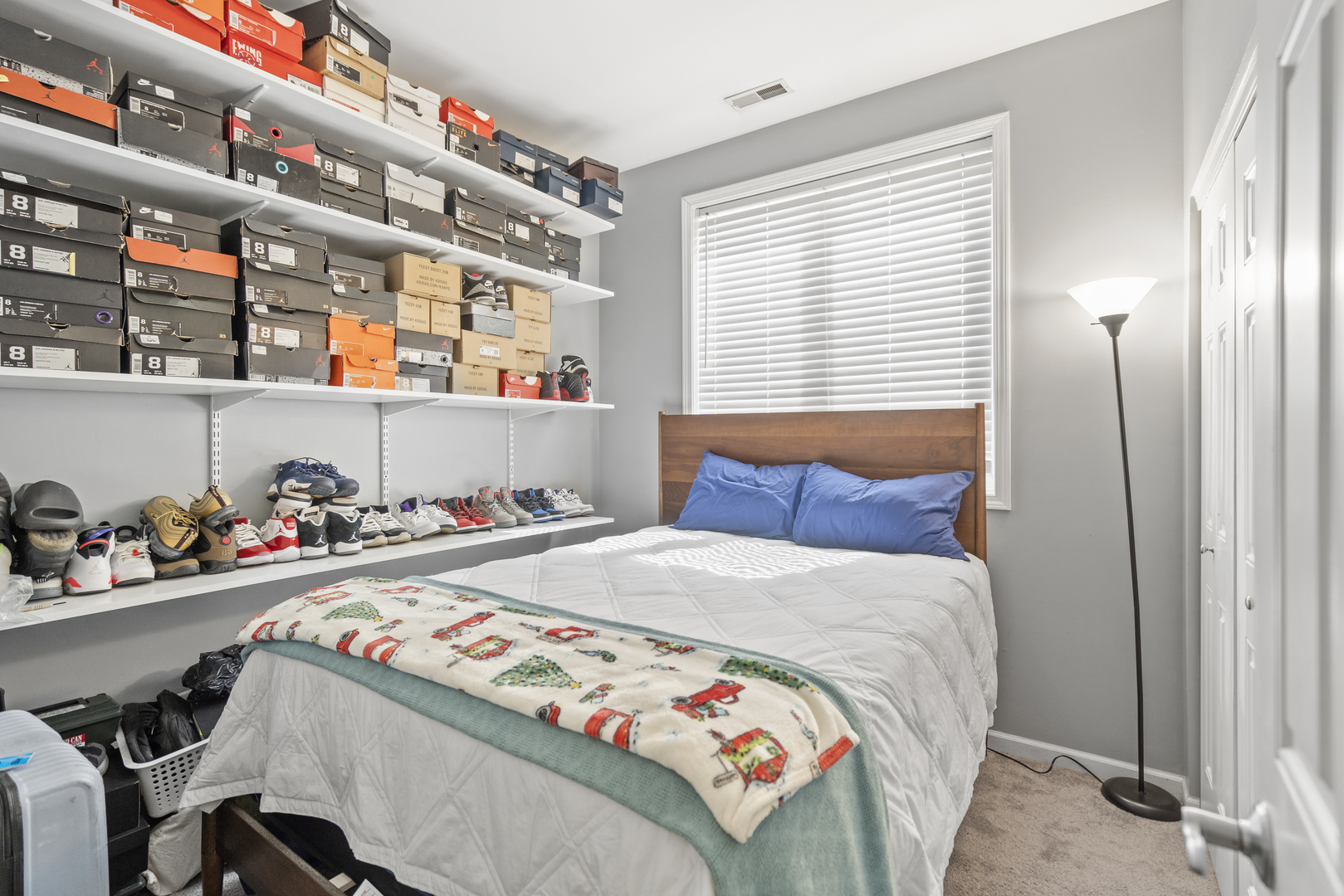 2539 West Warren Boulevard, Unit 2 Chicago, IL 60612 - Photo 9 of 14 a bedroom with a bed and a window