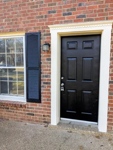 a front view of a house with a shower