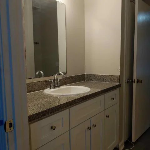 a front view of a house with a garage