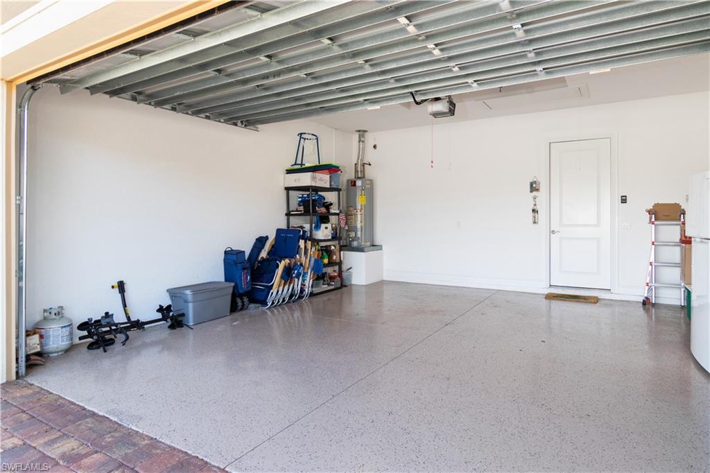 6604 Roma Way Naples, FL 34113 - Photo 18 of 21 a view of a room with gym equipment