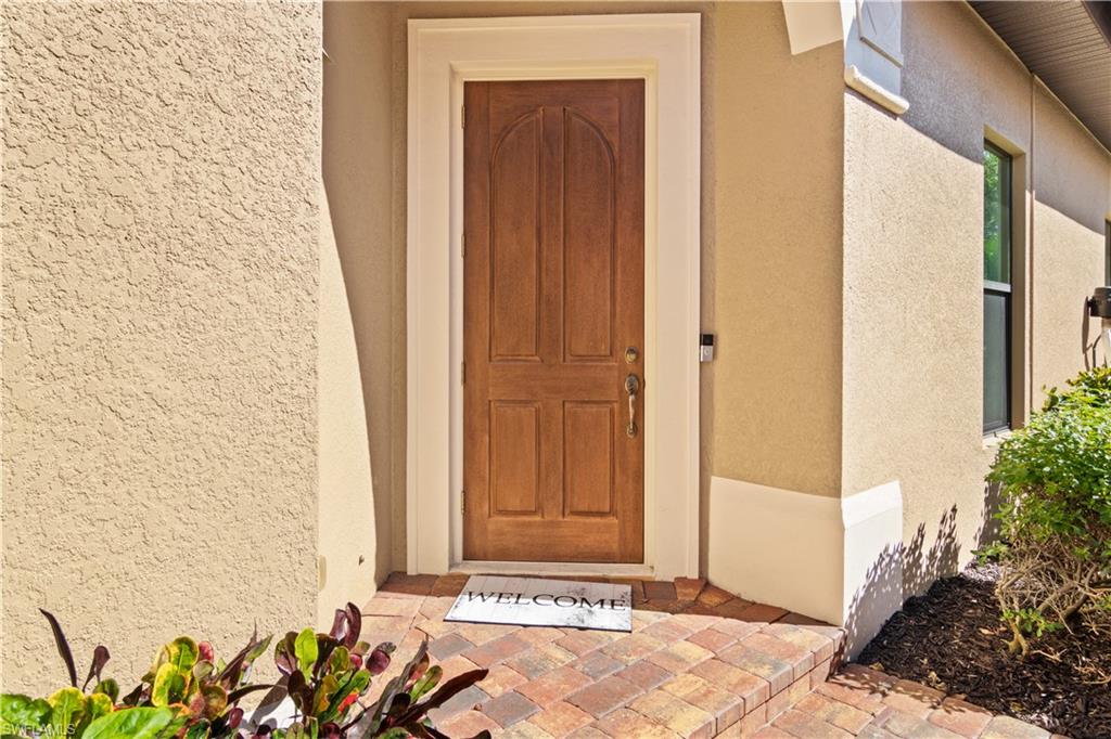 6604 Roma Way Naples, FL 34113 - Photo 3 of 21 a view of a entryway door
