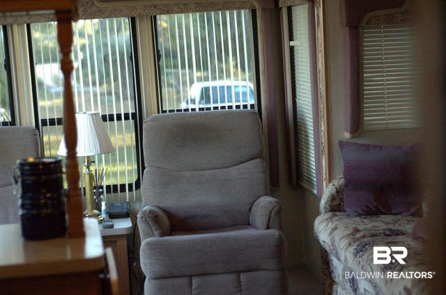 8599 West Fort Morgan Road West Gulf Shores, AL 36542 - Photo 16 of 17 two large recliners and sofa that folds out to bed