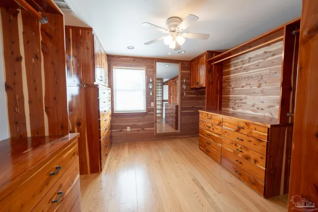 a utility room with sink dryer and washer