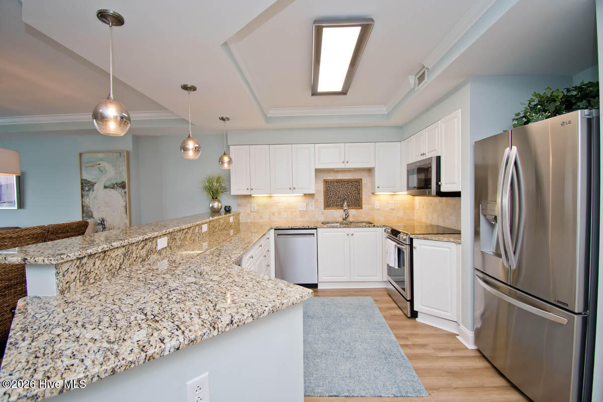 1550 Salter Path Road, Unit 409 Indian Beach, NC 28512 - Photo 12 of 45 Imagine cooking meals here.