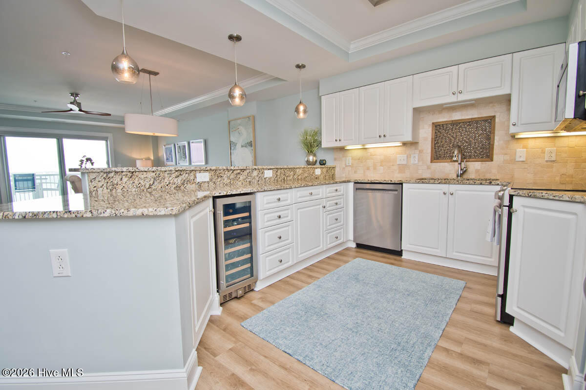 1550 Salter Path Road, Unit 409 Indian Beach, NC 28512 - Photo 12 of 46 The warmth of this kitchen!