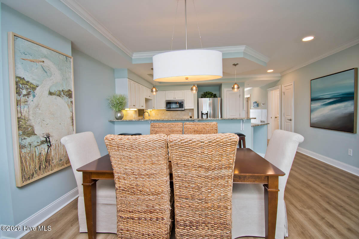 1550 Salter Path Road, Unit 409 Indian Beach, NC 28512 - Photo 9 of 46 Dining area