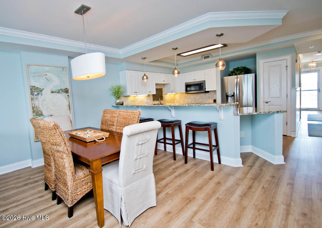 1550 Salter Path Road, Unit 409 Indian Beach, NC 28512 - Photo 9 of 45 Dining area