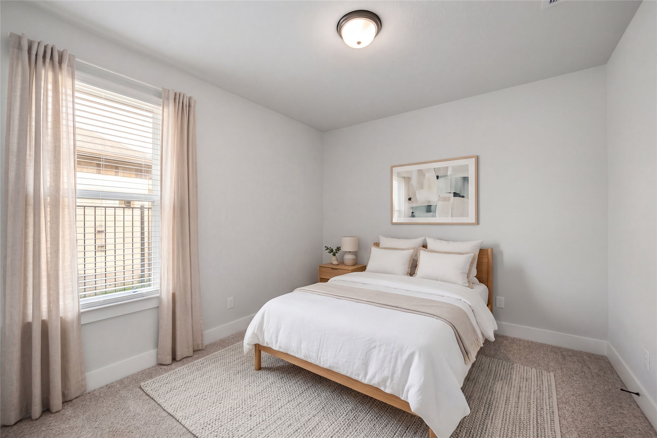 1831 Tioga Vw Drive Rosharon, TX 77583 - Photo 11 of 50 a bedroom with a bed and a window